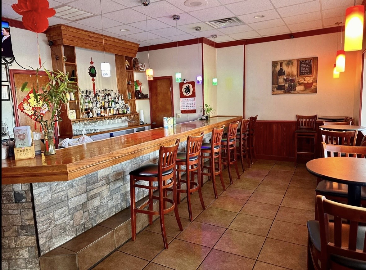 Wide view of the bar seating area at China Chefs Restaurant